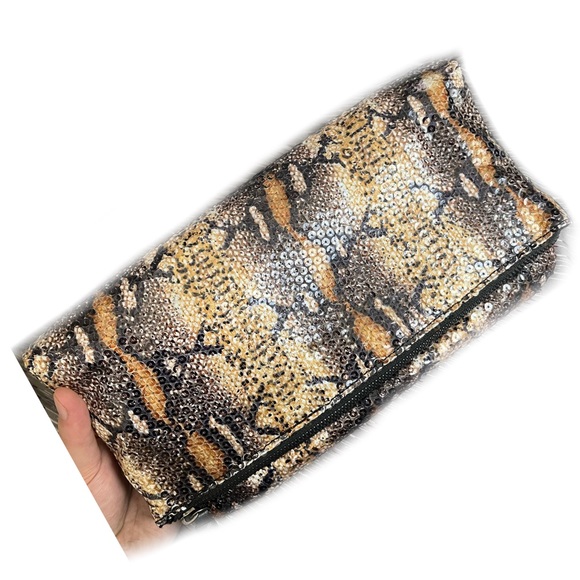 BCBGmaxazria White Glossy Sequined Styled Lazy Clutch in Animal Print Background - Picture 4 of 13
